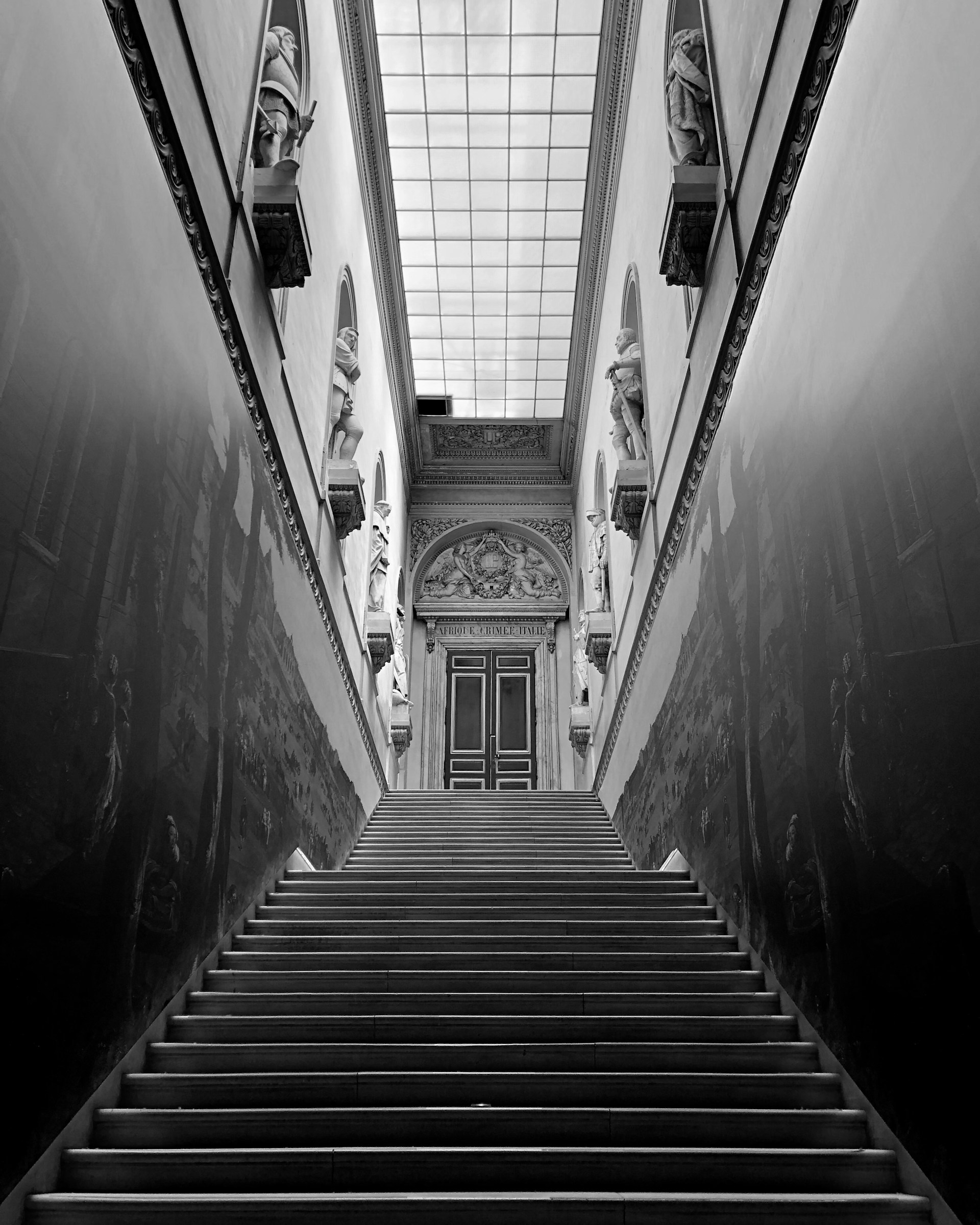 Architectural staircase between concrete walls